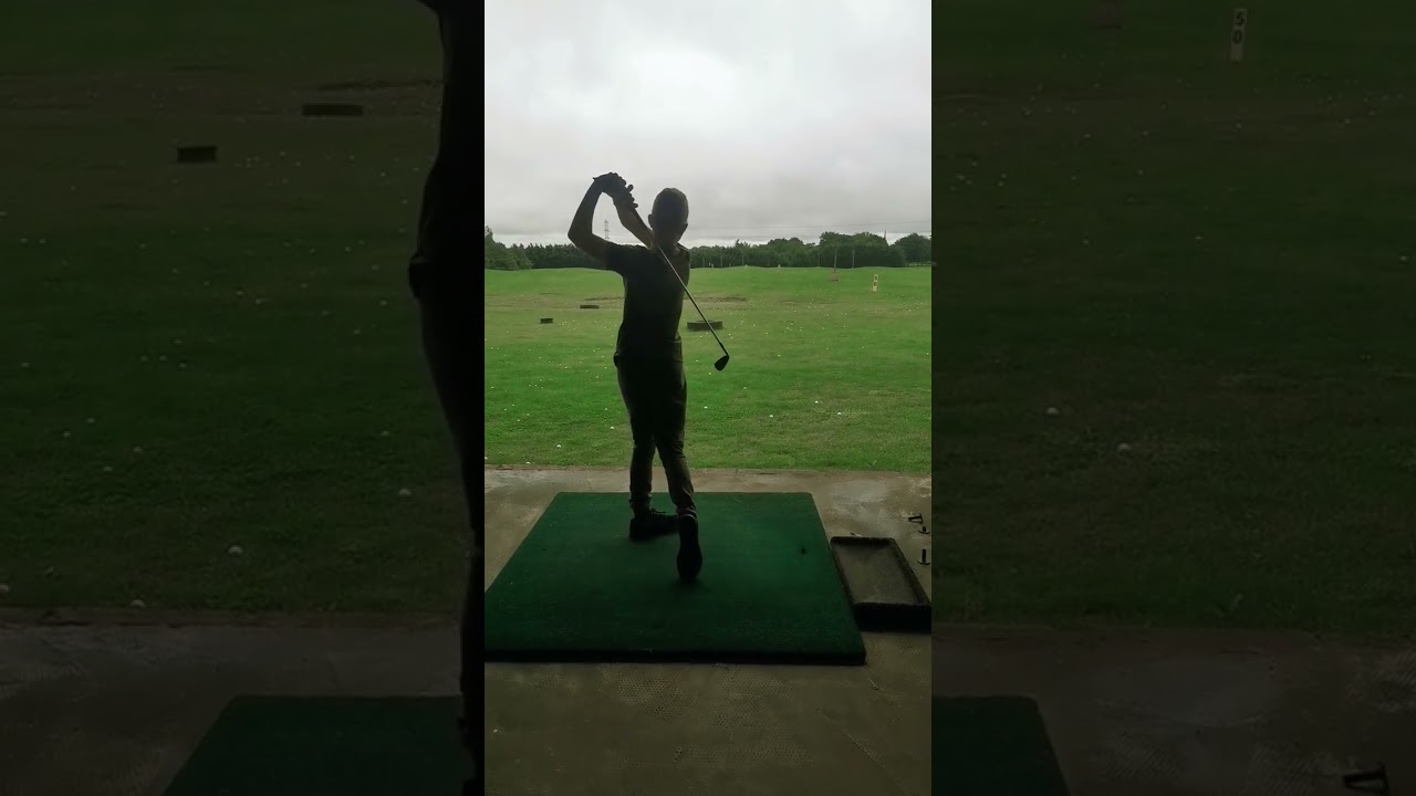 At-the-driving-range-may-see-some-more-golf-vids.jpg